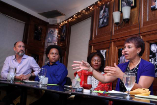 Attorney Jeanett P. Henry tells the Journal-isms Roundtable, “This legacy admission is not very useful.” With her are, from left, Adam Goodheart, director of Washington College’s C.V. Starr Center for the Study of the American Experience; Nickolaus Mack, American University student journalist; and lawyer Georgia H. Goslee.